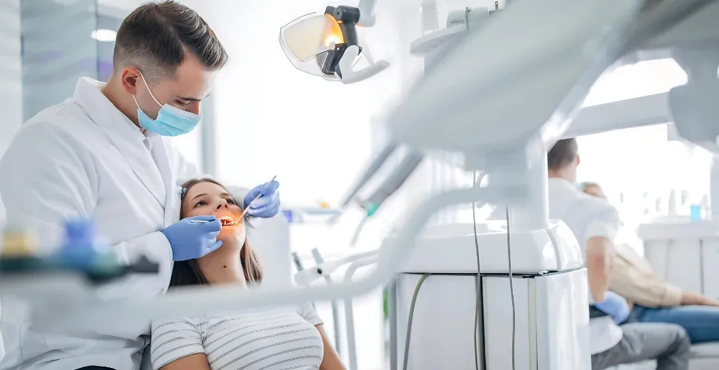 Illustration of a dental filling being placed in a molar