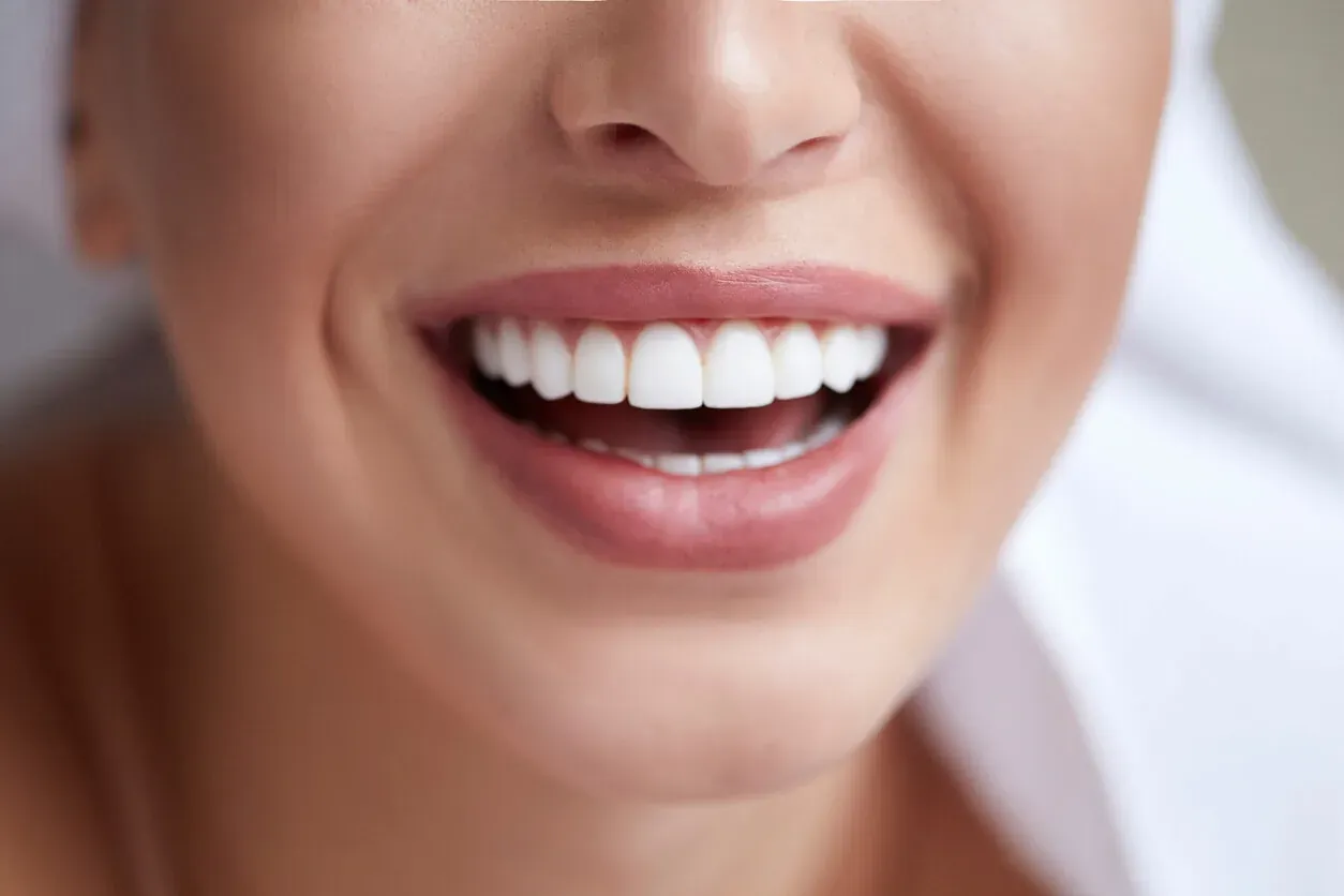 Parent and child meeting with a clinician at a first orthodontic visit